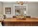 A dining area with a wooden table, unique chairs, and stylish decor at 78 Atlanta Se Ave, Atlanta, GA 30315