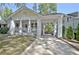 Charming home with a covered carport and a welcoming front porch with classic design elements at 78 Atlanta Se Ave, Atlanta, GA 30315