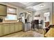 Stylish kitchen featuring stainless steel appliances, attractive cabinets, a table, and plenty of natural light at 78 Atlanta Se Ave, Atlanta, GA 30315