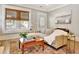 Bright living room with a comfy sofa, a patterned rug, and natural light from the windows at 78 Atlanta Se Ave, Atlanta, GA 30315