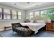 Spacious main bedroom with natural light and hardwood floors at 78 Atlanta Se Ave, Atlanta, GA 30315