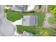 Aerial view of a well-manicured property, showcasing the house, yard, and driveway at 149 Manor Ln, Woodstock, GA 30188
