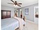 Bedroom with neutral walls and carpet, ceiling fan, furniture and doorways at 149 Manor Ln, Woodstock, GA 30188