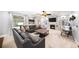 Spacious living room with plush carpet, a fireplace, and built-in shelving, perfect for entertainment and relaxation at 149 Manor Ln, Woodstock, GA 30188