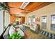 Cozy screened porch with comfortable seating, ceiling fan, and wooden ceiling at 149 Manor Ln, Woodstock, GA 30188