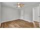 Bedroom features wood-look flooring and white doors at 2184 Cherokee Valley Cir, Lithonia, GA 30058