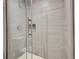 A glass shower shows tile walls and a built-in niche at 2184 Cherokee Valley Cir, Lithonia, GA 30058