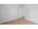 Empty bedroom with modern laminate flooring at 3650 River Rock Rd, Lithonia, GA 30038