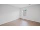 Bright bedroom with a window and hardwood floors at 3650 River Rock Rd, Lithonia, GA 30038