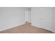 Bedroom featuring wood-look flooring and bright white trim and doors at 3650 River Rock Rd, Lithonia, GA 30038