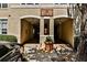 Exterior shot of covered entrance featuring arched openings and stucco siding at 955 Juniper Ne St # 4332, Atlanta, GA 30309