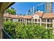 Beautiful exterior view of building with terracotta roof and an expansive city view at 955 Juniper Ne St # 4332, Atlanta, GA 30309