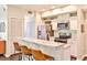 Modern kitchen with stainless steel appliances and breakfast bar at 955 Juniper Ne St # 4332, Atlanta, GA 30309
