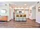 Inviting kitchen view with breakfast bar, stainless steel appliances, and dark wood floors at 955 Juniper Ne St # 4332, Atlanta, GA 30309