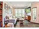 Relaxing living room featuring a comfortable gray sectional, TV, and lots of natural light at 955 Juniper Ne St # 4332, Atlanta, GA 30309