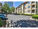 Paved parking lot with marked parking spaces for residents and guests with well-maintained landscaping at 955 Juniper Ne St # 4332, Atlanta, GA 30309
