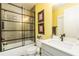Modern bathroom with a sleek glass-enclosed shower, stylish fixtures, and a clean, contemporary design at 963 South On Main Dr, Woodstock, GA 30188