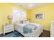 Charming bedroom with coastal decor, light-colored walls, and ample natural light at 963 South On Main Dr, Woodstock, GA 30188