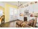 Dining room with wine storage, comfortable armchair, and access to patio at 963 South On Main Dr, Woodstock, GA 30188