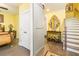 Welcoming entryway features hardwood floors, a stylish barn door, and an elegant console table with a mirror at 963 South On Main Dr, Woodstock, GA 30188