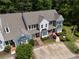 A beautiful aerial view of well-maintained townhomes nestled among lush greenery at 1002 Saddle Hl, Marietta, GA 30068