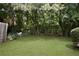 Expansive backyard featuring lush greenery, mature trees, and a well-manicured lawn at 1002 Saddle Hl, Marietta, GA 30068