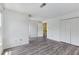 Bedroom with vinyl floors and closet at 1002 Saddle Hl, Marietta, GA 30068