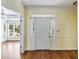 Welcoming entryway with hardwood floors and view to sunroom at 1002 Saddle Hl, Marietta, GA 30068