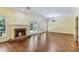 Living room featuring a fireplace, hardwood floors and a chandelier at 1002 Saddle Hl, Marietta, GA 30068