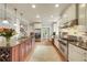 Bright kitchen with stainless steel appliances, granite countertops, and ample cabinet space at 1356 Emory Ne Rd, Atlanta, GA 30306