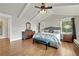 Angle view of the main bedroom with vaulted ceilings and hardwood floors at 1356 Emory Ne Rd, Atlanta, GA 30306