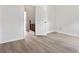 Bedroom with laminate floors and staircase access at 2025 Oakley Se Trce, Smyrna, GA 30080