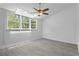 Bright bedroom features hardwood floors, a ceiling fan and skylight at 2025 Oakley Se Trce, Smyrna, GA 30080