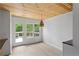 Dining area next to the kitchen with big windows and a door to the back porch at 2025 Oakley Se Trce, Smyrna, GA 30080