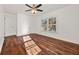 Unfurnished bedroom featuring hardwood flooring and ceiling fan at 2584 Oldknow Dr, Atlanta, GA 30318