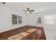 Unfurnished bedroom featuring hardwood flooring and a ceiling fan at 2584 Oldknow Dr, Atlanta, GA 30318
