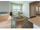 Dining area with a round table and seating for four, bathed in natural light at 360 Hayden Cir, Woodstock, GA 30189