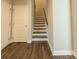 Entryway showcases a staircase with wood treads, paired with elegant white trim at 360 Hayden Cir, Woodstock, GA 30189