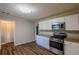 Bright kitchen featuring stainless steel appliances, granite countertops, and ample storage space at 4650 Big Valley Ct, Stone Mountain, GA 30083
