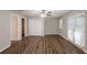 Spacious living room showcasing sleek flooring, neutral walls, and inviting natural light at 4650 Big Valley Ct, Stone Mountain, GA 30083