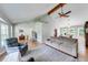 Spacious living room showcasing high ceilings, hardwood floors, and comfortable furnishings at 850 Old Spring Way, Sugar Hill, GA 30518