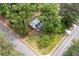 A bird's-eye view showcases a property's well-maintained lawn, mature trees, and proximity to neighborhood streets at 550 Stewart Nw Ave, Marietta, GA 30064