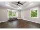 Sunlit bedroom featuring a window seat and views of the surrounding trees at 550 Stewart Nw Ave, Marietta, GA 30064
