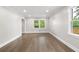 Bright bedroom featuring hardwood flooring, large windows and neutral walls at 550 Stewart Nw Ave, Marietta, GA 30064
