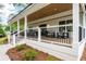 Charming porch with wood ceiling and ample seating; perfect for enjoying the outdoors at 550 Stewart Nw Ave, Marietta, GA 30064