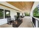 Charming front porch with rocking chairs and a wood ceiling is great for relaxing outdoors at 550 Stewart Nw Ave, Marietta, GA 30064
