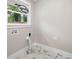 Laundry room with window, utility hookups, and 'Laundry Room' decorative sign at 550 Stewart Nw Ave, Marietta, GA 30064