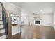 Open-concept living room with a fireplace and abundant natural light, perfect for entertaining at 550 Stewart Nw Ave, Marietta, GA 30064