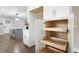 Spacious pantry showcasing pull-out shelves for easy storage and organization in this updated kitchen at 550 Stewart Nw Ave, Marietta, GA 30064