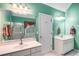 Bathroom with double sinks, tile floors, shower, and tub with a window at 3953 Lorien Nw Way, Kennesaw, GA 30152